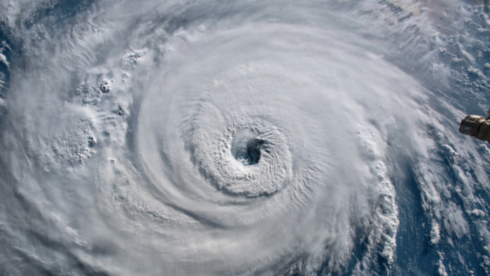 Why Hurricanes Disproportionately Impact Communities of Color giving compass